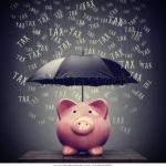 umbrella-hiding-piggy-bank-savings-600w-561870085